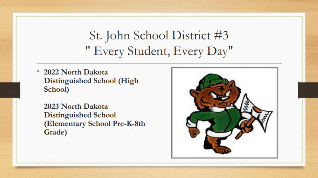 screenshot of a slide with the following text: St. John School District #3, "Every Student, Every Day", 2022 North Dakota Distinguished School (high school), 2023 North Dakota Distinguished School (elementary school pre-k-8th grade)
